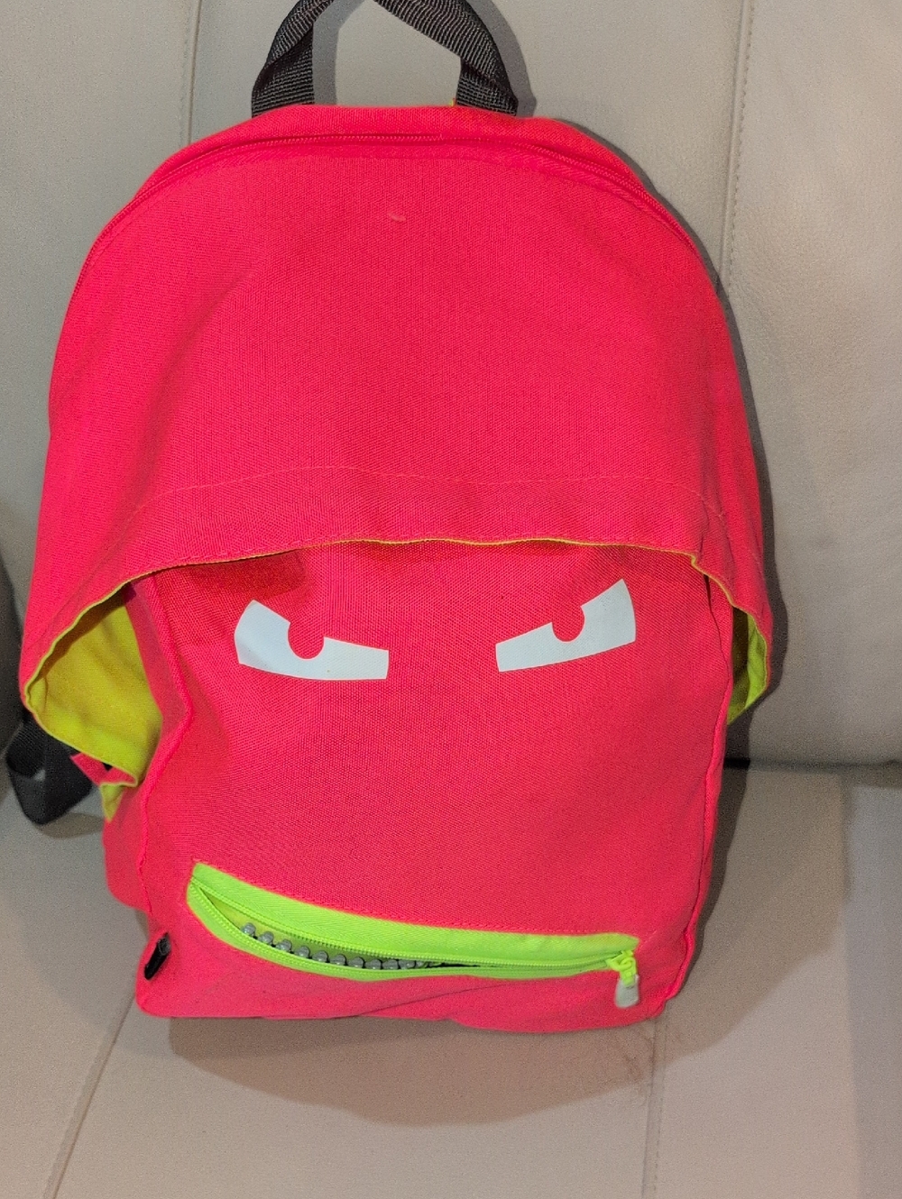 Kids Pink Backpack with Neon Green Accents- Playful Face Design By Zip it Grills